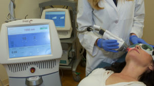 Patient undergoing treatment with Fraxel Laser Trio